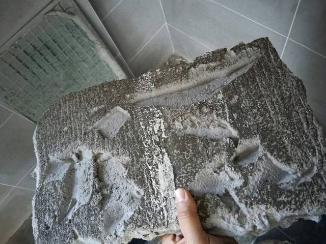 瓷砖空鼓上门维修电话(空鼓注浆处理多少钱一平方)